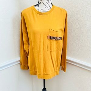 Have long sleeve mustard shirt S